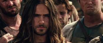 Movie still from “Alexander” (2004), directed by Oliver Stone – A person with long hair; Close Up shot, Over the shoulder angle