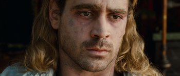 Movie still from “Alexander” (2004), directed by Oliver Stone – A person with long hair; Close Up shot, Low angle