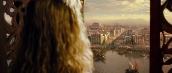 Movie still from “Alexander” (2004), directed by Oliver Stone – A view of a city from a window of a building; Extreme Wide shot, High angle