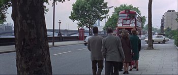Movie still from “Alfie” (1966), directed by Lewis Gilbert – A group of people walking down a street; Wide shot, High angle