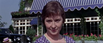 Movie still from “Alfie” (1966), directed by Lewis Gilbert – A person with short hair; Close Up shot, Over the shoulder angle