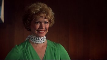 Movie still from “Alice Doesn't Live Here Anymore” (1974), directed by Martin Scorsese – A person wearing a green shirt; Close Up shot, Low angle