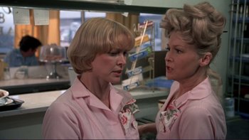 Movie still from “Alice Doesn't Live Here Anymore” (1974), directed by Martin Scorsese – A couple of women standing next to each other; Close Up shot, Over the shoulder angle