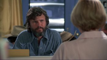 Movie still from “Alice Doesn't Live Here Anymore” (1974), directed by Martin Scorsese – A man sitting at a table in front of a woman; Close Up shot, Over the shoulder angle