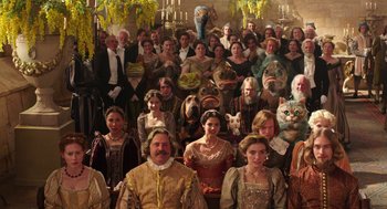 Movie still from “Alice Through the Looking Glass” (2016), directed by James Bobin – A group of people dressed up in costumes for halloween; Wide shot, High angle