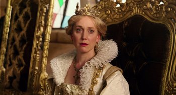 Movie still from “Alice Through the Looking Glass” (2016), directed by James Bobin – A woman wearing a white dress and a crown; Close Up shot, Over the shoulder angle
