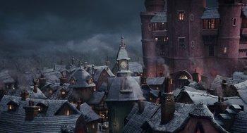 Movie still from “Alice Through the Looking Glass” (2016), directed by James Bobin – A clock on the top of a tower in the middle of a city; Extreme Wide shot, High angle