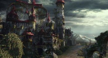 Movie still from “Alice Through the Looking Glass” (2016), directed by James Bobin – An old castle is shown in the middle of a road; Extreme Wide shot, Low angle