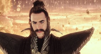 Movie still from “Alice Through the Looking Glass” (2016), directed by James Bobin – A person with a beard; Close Up shot, Low angle