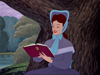 Movie still from “Alice in Wonderland” (1951), directed by Wilfred Jackson – A woman sitting in front of a tree reading a book; Medium shot, High angle