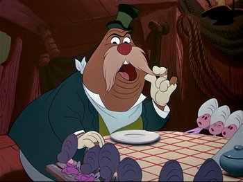 Movie still from “Alice in Wonderland” (1951), directed by Wilfred Jackson – A man with a beard is eating at a table in a restaurant; Medium shot, Over the shoulder angle