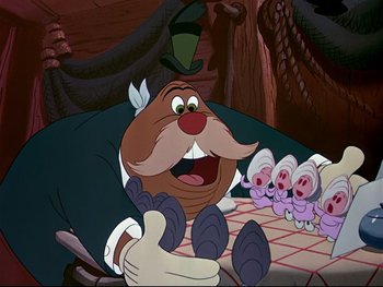 Movie still from “Alice in Wonderland” (1951), directed by Wilfred Jackson – A group of mice sitting on a table in front of a cartoon character; Medium shot, Over the shoulder angle