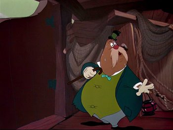 Movie still from “Alice in Wonderland” (1951), directed by Wilfred Jackson – A man in a green jacket holding a stick; Medium shot, Low angle
