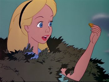 Movie still from “Alice in Wonderland” (1951), directed by Wilfred Jackson – A blonde woman holding a banana in her hand; Close Up shot, Overhead angle
