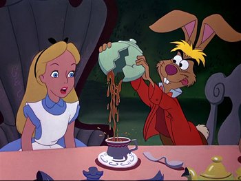Movie still from “Alice in Wonderland” (1951), directed by Wilfred Jackson – A woman sitting at a dinner table with a man in a rabbit costume; Medium shot, Overhead angle