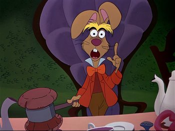 Movie still from “Alice in Wonderland” (1951), directed by Wilfred Jackson – A cartoon of a mouse wearing a red bow tie; Medium shot, Over the shoulder angle