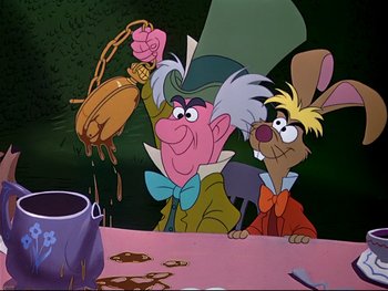 Movie still from “Alice in Wonderland” (1951), directed by Wilfred Jackson – Two cartoon characters sitting in front of a table; Medium shot, Overhead angle