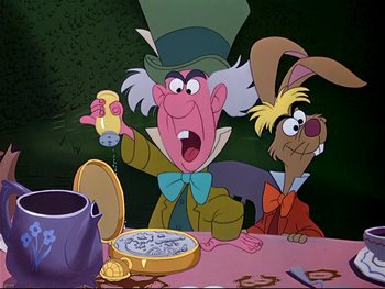 Movie still from “Alice in Wonderland” (1951), directed by Wilfred Jackson – A group of people sitting at a table with food and drinks; Medium shot, Overhead angle