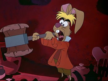 Movie still from “Alice in Wonderland” (1951), directed by Wilfred Jackson – A cartoon of a rabbit holding an ax in his mouth; Medium shot, Over the shoulder angle