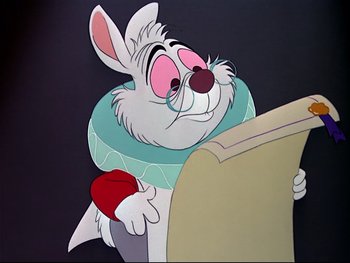 Movie still from “Alice in Wonderland” (1951), directed by Wilfred Jackson – A cartoon rabbit reading a book while wearing a neck brace; Close Up shot, Low angle