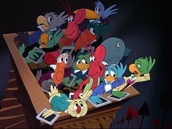 Movie still from “Alice in Wonderland” (1951), directed by Wilfred Jackson – A group of cartoon characters sitting on top of a table; Wide shot, High angle
