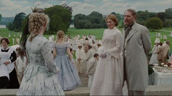 Movie still from “Alice in Wonderland” (2010), directed by Tim Burton – A group of people dressed up in white clothes; Wide shot, Over the shoulder angle