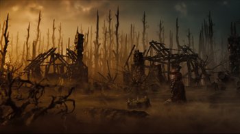 Movie still from “Alice in Wonderland” (2010), directed by Tim Burton – An image of an image of a forest in the middle of the night; Extreme Wide shot, Low angle