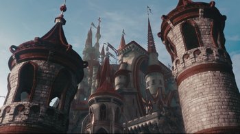 Movie still from “Alice in Wonderland” (2010), directed by Tim Burton – A castle like building that has many spires; Extreme Wide shot, Low angle