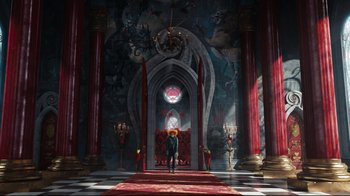 Movie still from “Alice in Wonderland” (2010), directed by Tim Burton – A man standing in a room with a red carpet; Extreme Wide shot, Low angle