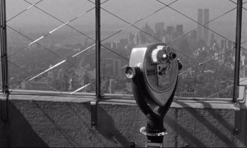 Movie still from “Alice in the Cities” (1974), directed by Wim Wenders – A view of a city from the top of the empire state building; Wide shot, High angle