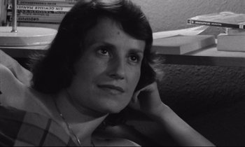 Movie still from “Alice in the Cities” (1974), directed by Wim Wenders – Black and white photograph of a woman on a cell phone; Close Up shot, Low angle