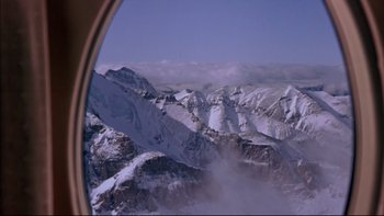 Movie still from “Alive” (1993), directed by Frank Marshall – A view from a plane of a snowy mountain range; Extreme Wide shot, High angle