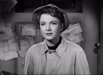 Movie still from “All About Eve” (1950), directed by Joseph L. Mankiewicz – A black - and - white photo of a woman wearing a hat; Close Up shot, High angle
