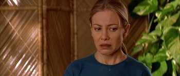 Movie still from “All About My Mother” (1999), directed by Pedro Almodóvar – A person wearing a blue shirt; Close Up shot, Over the shoulder angle