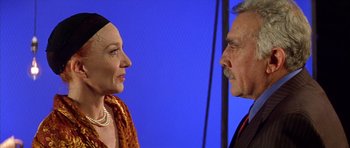 Movie still from “All About My Mother” (1999), directed by Pedro Almodóvar – An older man and a younger woman face to face; Close Up shot, Over the shoulder angle