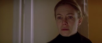 Movie still from “All About My Mother” (1999), directed by Pedro Almodóvar – A person looking at the camera; Close Up shot, Over the shoulder angle