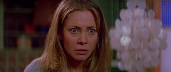 Movie still from “All About My Mother” (1999), directed by Pedro Almodóvar – A person with eyes wide open; Close Up shot, Low angle