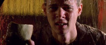 Movie still from “All About My Mother” (1999), directed by Pedro Almodóvar – A person taking a shower; Close Up shot, Low angle