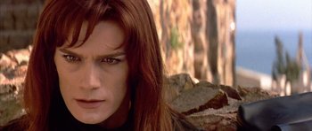 Movie still from “All About My Mother” (1999), directed by Pedro Almodóvar – A person with long red hair; Close Up shot, Over the shoulder angle