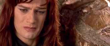 Movie still from “All About My Mother” (1999), directed by Pedro Almodóvar – A person with long red hair; Close Up shot, Overhead angle