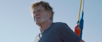 Movie still from “All Is Lost” (2013), directed by J.C. Chandor – An older man looking up into the sky; Close Up shot, Low angle