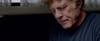 Movie still from “All Is Lost” (2013), directed by J.C. Chandor – An older man is looking down at the floor; Close Up shot, Low angle