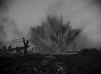 Movie still from “All Quiet on the Western Front” (1930), directed by Lewis Milestone – An image of an explosion in the sky; Extreme Wide shot, Low angle