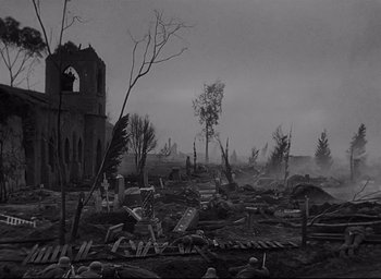 Movie still from “All Quiet on the Western Front” (1930), directed by Lewis Milestone – An image of an old cemetery in the middle of the day; Extreme Wide shot, High angle