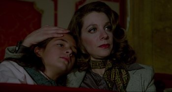Movie still from “All That Jazz” (1979), directed by Bob Fosse – A woman and a girl sitting next to each other; Close Up shot, Low angle