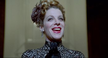 Movie still from “All That Jazz” (1979), directed by Bob Fosse – A person wearing a dress; Close Up shot, Low angle