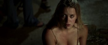 Movie still from “All the Boys Love Mandy Lane” (2006), directed by Jonathan Levine – A beautiful young woman with long blonde hair; Close Up shot, Over the shoulder angle