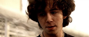 Movie still from “All the Boys Love Mandy Lane” (2006), directed by Jonathan Levine – A person wearing a necklace; Close Up shot, Low angle