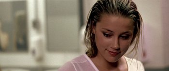 Movie still from “All the Boys Love Mandy Lane” (2006), directed by Jonathan Levine – A person with wet hair; Close Up shot, Over the shoulder angle