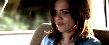 Movie still from “All the Boys Love Mandy Lane” (2006), directed by Jonathan Levine – A person sitting in a car; Close Up shot, Over the shoulder angle